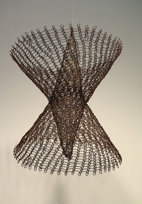 Rith (Aiko) Asawa. Untitled, c1950s. Looped brass & iron wire, 13 x 11 x 11 in. Loretta Howard Gallery. Photograph: Miguel Benavides.