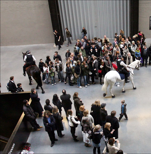 Tania Bruguera. Tatlin's Whispers #5, 2008. Medium: Decontextualization of an action. Materials: Mounted police, crowd control techniques, audience, dimensions variable. Performance view at UBS Openings: Live The Living Currency, Tate Modern. Photograph: Sheila Burnett. Courtesy Tate Modern.